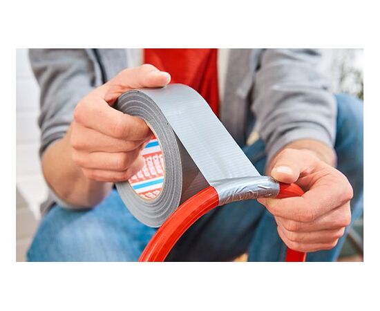 Армированная клейкая лента Tesa Extra Power [T56388-00000-12] (серая, тканевая основа, 25 м x 50 мм) фотография 5