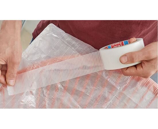 Сверхпрочная армированная клейкая лента Tesa Extra Power [T56395-00000-00] для наружных ремонтных работ (прозрачная, 25 м x 48 мм) фотография 3