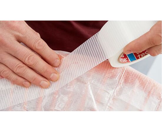 Сверхпрочная армированная клейкая лента Tesa Extra Power [T56395-00000-00] для наружных ремонтных работ (прозрачная, 25 м x 48 мм) фотография 5